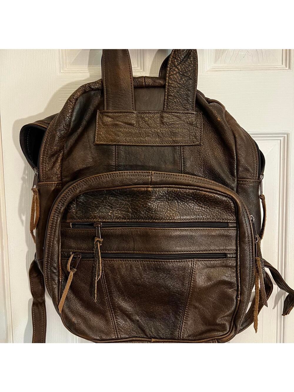 Brown genuine leather backpack with